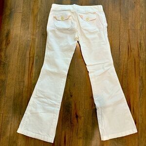 Abercrombie and Fitch white flared pants. Size 0.. pink inner pocket. EUC